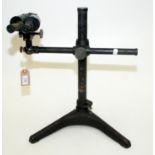 An optician's binocular instrument by Carl Zeiss Jena, on adjustable stand.