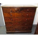 An early Victorian large mahogany chest with figured veneer,