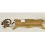 A bronze Viennese style lizard, length 18cm, together with a brass cribbage board.
