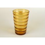 A Whitefriars ribbed conical amber glass vase, 25.5cm.