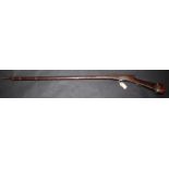 An eastern matchlock musket full length 149cm.