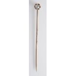A stick pin with screw on diamond finial, cased.