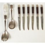 A pair of silver salad servers, one lacks its cut glass handle,