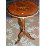 A Victorian walnut snap top small tripod table, with star inlaid top.