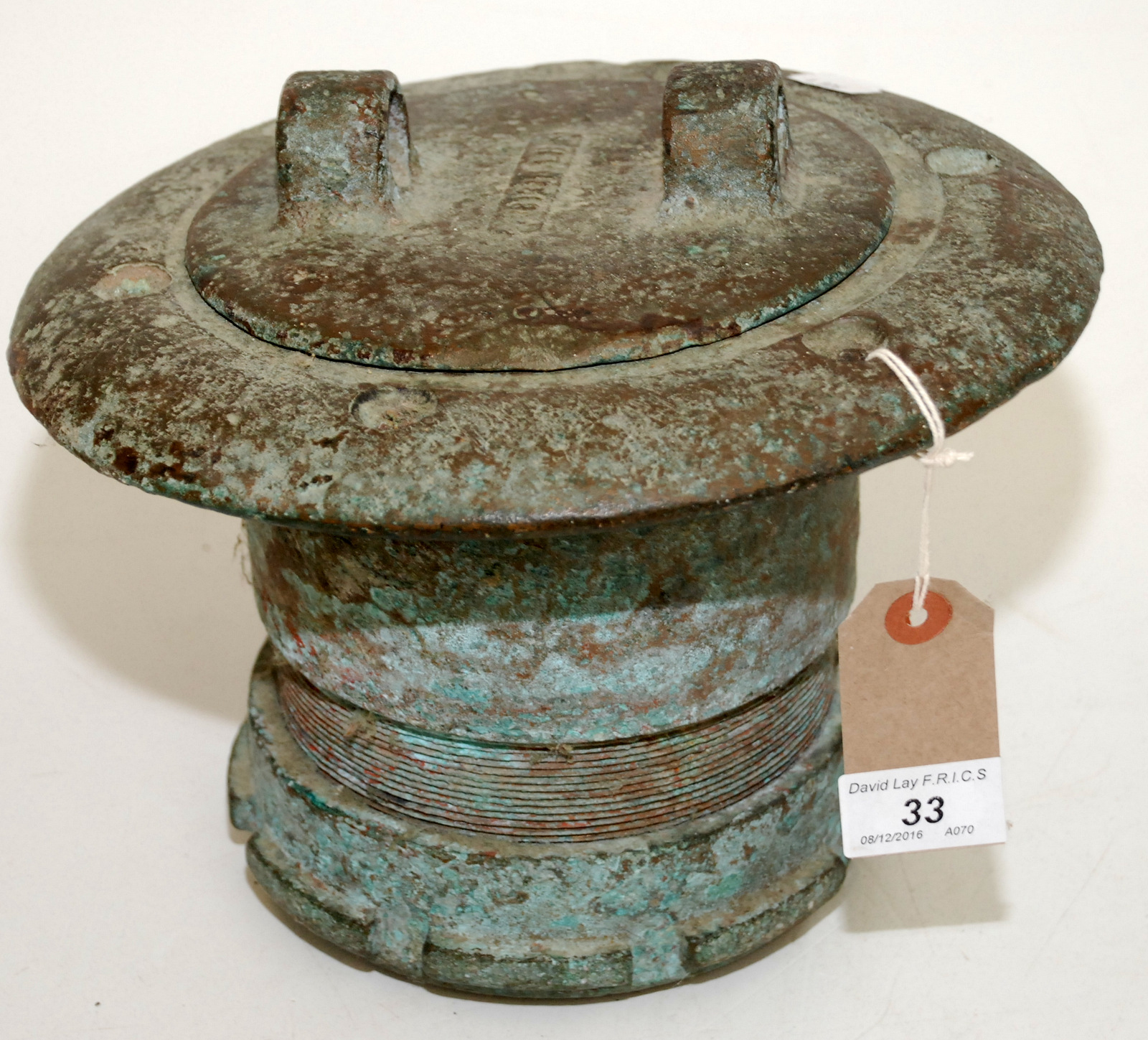 A ship's circular bronze inspection cover, the lid with a pair of lugs, diameter 25.5cm. - Image 2 of 2