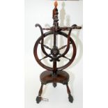A Regency lyre turned wood spinning wheel, full height 83.5cm.