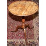 A country made part yew wood tripod table with baluster pedestal, diameter 53.5cm.