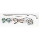 A turquoise set brooch and a paste set brooch,
