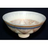 A Mary Rich studio porcelain bowl, the rim running pale blue, diameter 16cm.