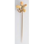 A rare European high purity gold flower finial pin, the petals of elk tooth.