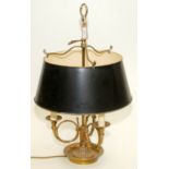 A Bouillotte lamp in French directoire style with three hunting horn branches.