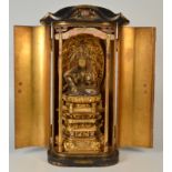 A Japanese giltwood and black lacquered shrine, 19th century,