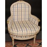 A French Louis XVI style armchair.