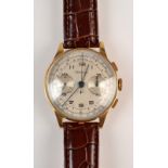 An 18ct. gold gentleman's Chronograph Suisse watch, oversize 37mm case, base metal back.