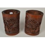 A pair of Chinese bamboo brush pots, 19th century, each with a carved pagoda, figures,