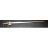 A 19th century naval sword with a basket guard and sharkskin wire bound grip, full length 95.5cm.