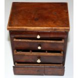 A Victorian mahogany veneered Scandinavian miniature chest of drawers.