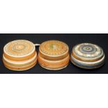 Three Mary Rich studio porcelain boxes, the lid of two with orange banding.