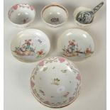 Five Chinese porcelain saucer dishes, 18th and 19th century, three tea bowls and a spoon.