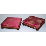 A pair of Victorian square, walnut footstools on turned feet.