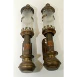 A pair of reproduction brass G.W.R. oil lamps.