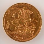 A Victorian old head Melbourne mint sovereign dated 1899, good, very fine.