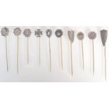 Ten traditional Victorian silver pins.