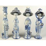 A group of four Bjorn Wiinblad Danish blue and white earthenware figures representing the seasons