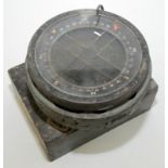 An ex W.D. compass on a sprung metal mount, diameter 16.8cm.
