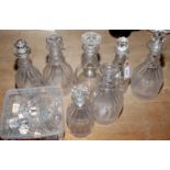 Seven Georgian and later decanters, together with various stoppers.