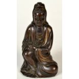 A Japanese bronze figure of a seated Kuan Yin, Godess of Mercy and Children,