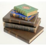 Two Victorian poetry books and a set of three gardening books.