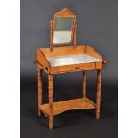 A child's late Victorian marble top washstand with swing mirror on simulated bamboo supports with