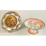 An 18th century Naples porcelain plate the centre gold ground moulded with a Grecian maiden and a