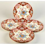 A set of six Brownfield Indian pattern brightly coloured and gilt plates and matching low comport