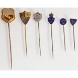 Two Danish enamelled silver pins and four other enamelled armorial pins.