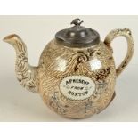 A Victorian Staffordshire brown woodgrain printed teapot "A Present From Buxton" and a further