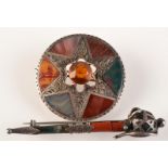 A silver and hardstone broadsword brooch and one other silver and hardstone brooch.