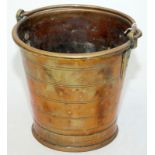 A brass bucket.