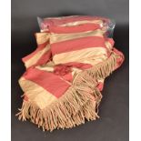 Two pairs of gold and deep red wide strip curtains with swags and bullion fringing,