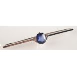 An Art Deco sapphire bar brooch.