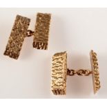 A pair of heavy, bark textured 9ct. gold cufflinks, 19g.