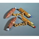 A exceptional pair of French enamelled 18ct. gold, cigar and matches cufflinks (See illustration).