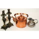 A Scandinavian copper kettle with a hinged spout cover,