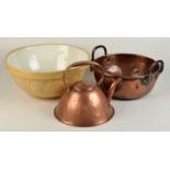 A Victorian copper preserve pan with twin iron handles,