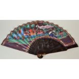 A 19th century Chinese lacquer fan painted with female figures with ivory faces and riverside