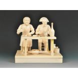 A 19th century Dieppe ivory group of a cobbler and his wife,