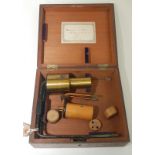 An electrical resistance apparatus by Elliott Bros. in a mahogany case.