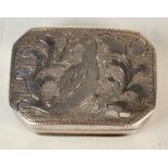 A George IV silver concave vinaigrette, the lid engraved with a bird and foliage.