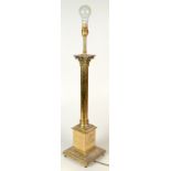 A brass classical column table lamp.